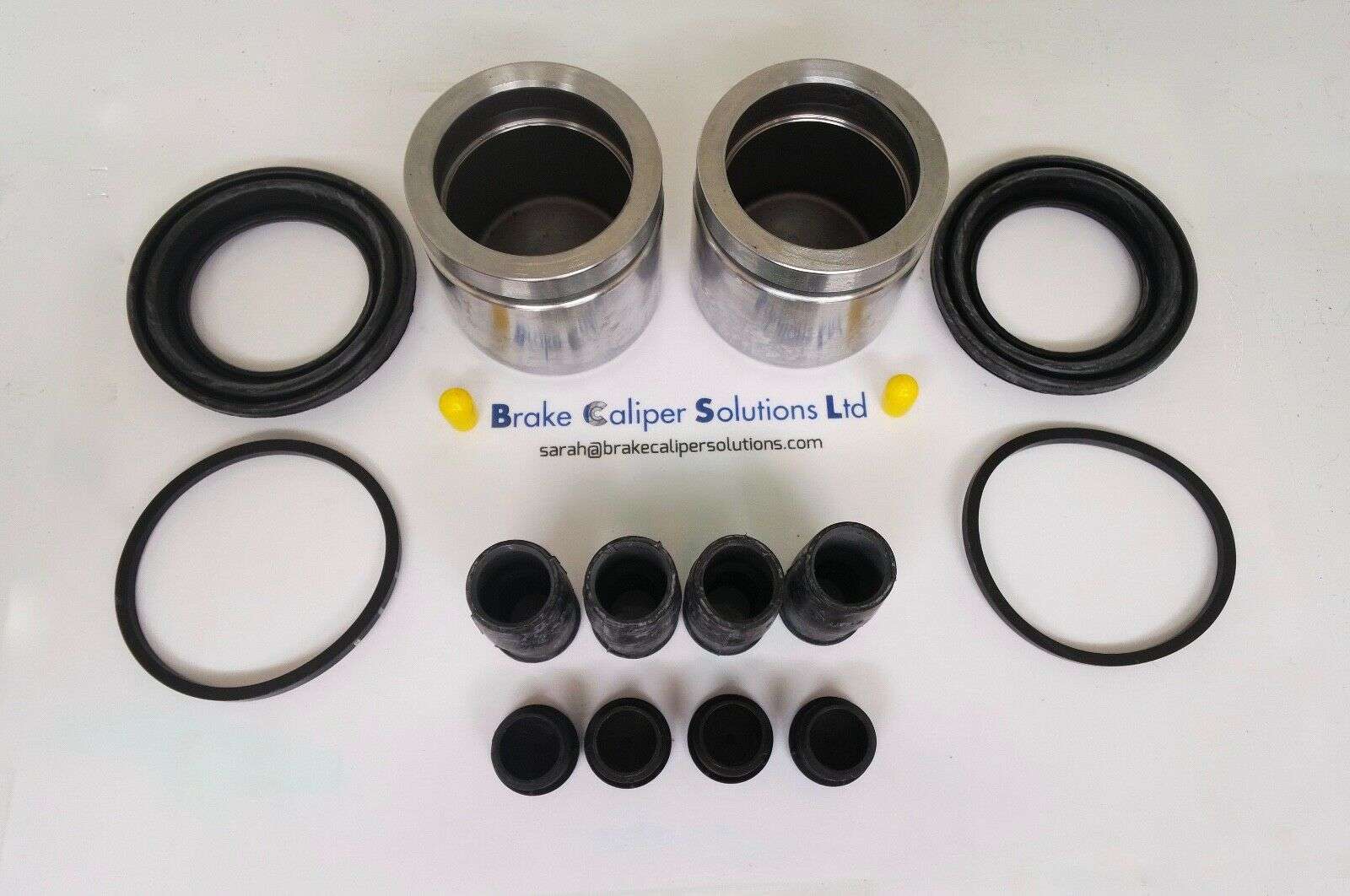 FRONT AXLE Brake Caliper Repair Kit + Pistons 57mm for Volvo C70 S70 &amp; V70